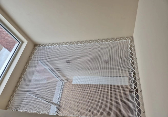 Project Stef: Installation de Filet de Sécurité dans une Maison